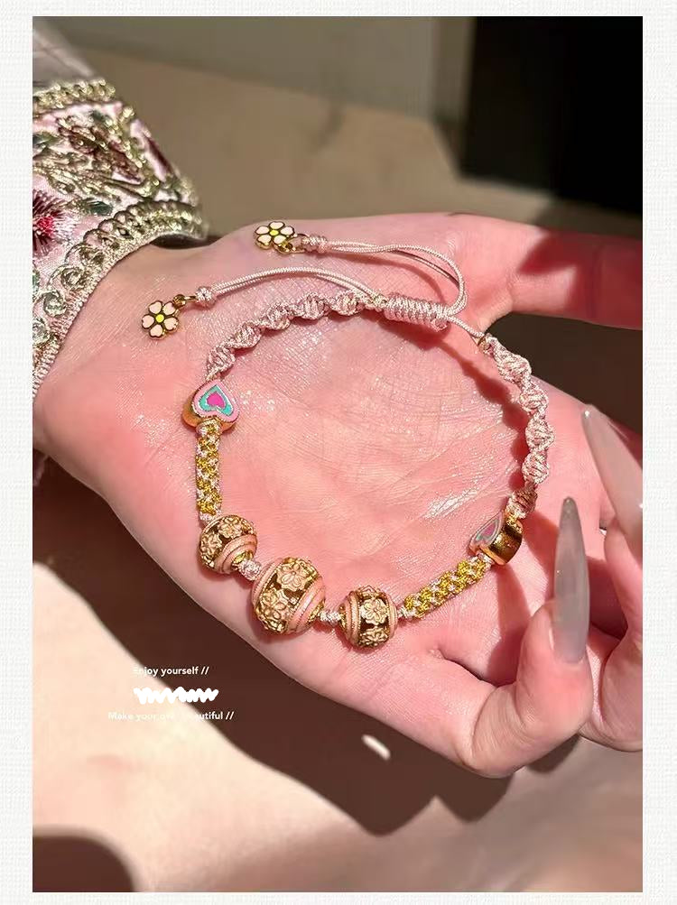 Copper-plated 14K gold hand-woven rope prosperity bracelet [ball]